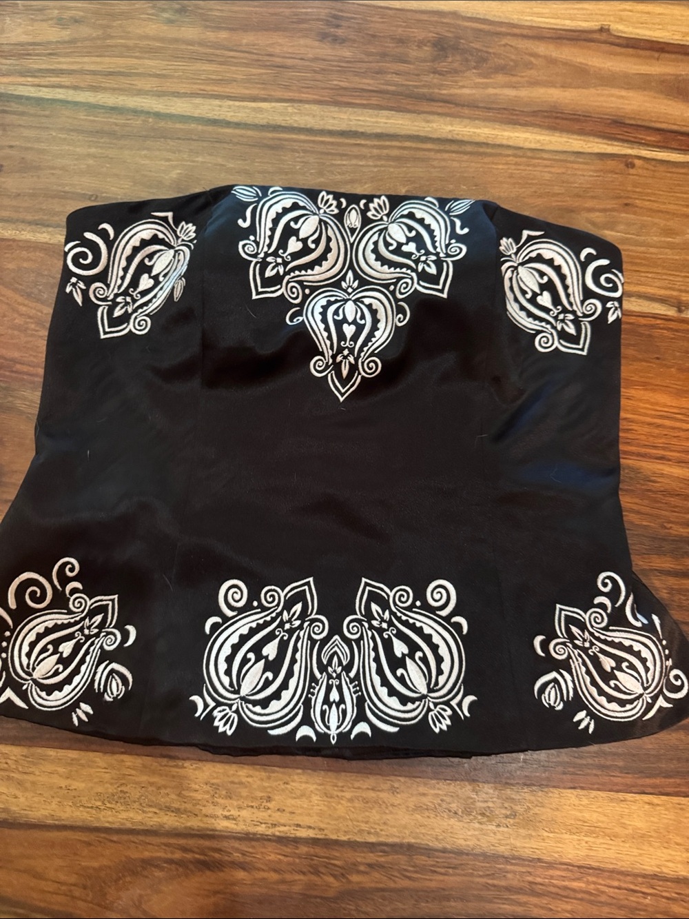 White House Black Market Black Strapless corset boot with White Paisley Motif.